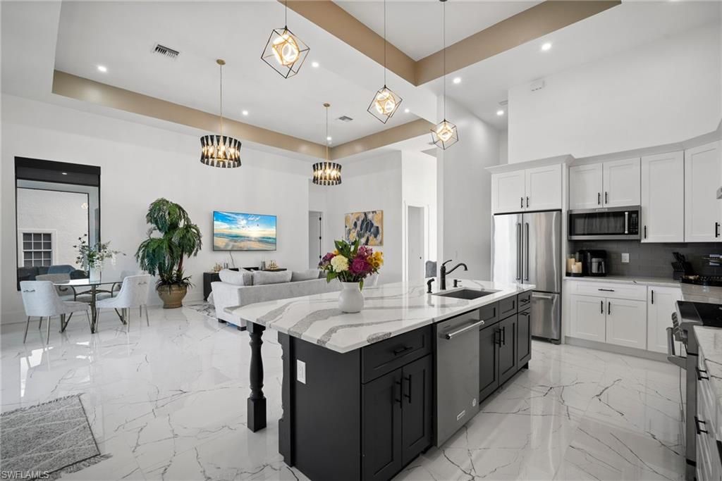 Dining room, Interior, Kitchen, Living room, Marble, Pendant Lights, Recessed Lighting, Stainless Steel Appliances