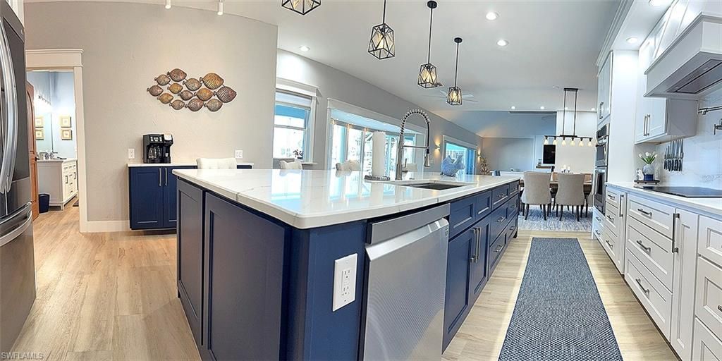 Dining room, Interior, Kitchen, Pendant Lights, Recessed Lighting, Stainless Steel Appliances, Wood Texture Flooring