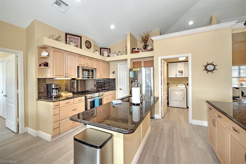 Interior, Kitchen, Recessed Lighting, Stainless Steel Appliances, Washer, Wood Texture Flooring