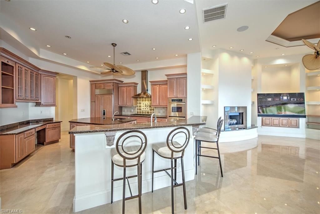 Fireplace, Interior, Kitchen, Recessed Lighting, Stainless Steel Appliances