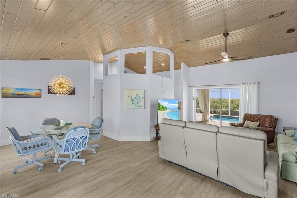 Dining room, Interior, Living room, Pendant Lights, Recessed Lighting, Wooden Ceilings, Wood Texture Flooring