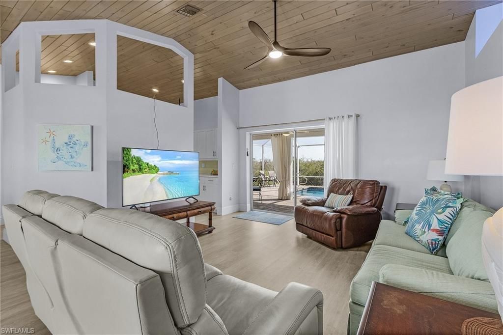 Interior, Living room, Recessed Lighting, Water, Wooden Ceilings, Wood Texture Flooring