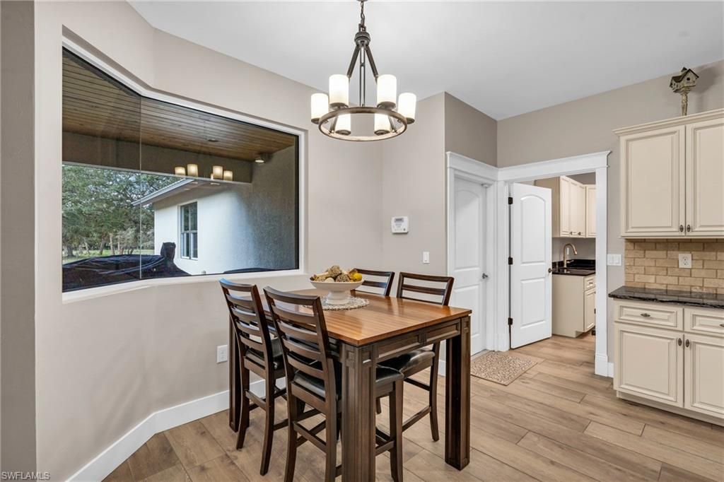 Chandelier, Dining room, Interior, Kitchen, Pendant Lights, Wood Texture Flooring