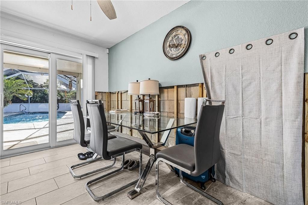 Dining room, Interior, Pool, Sun Room, Wood Texture Flooring