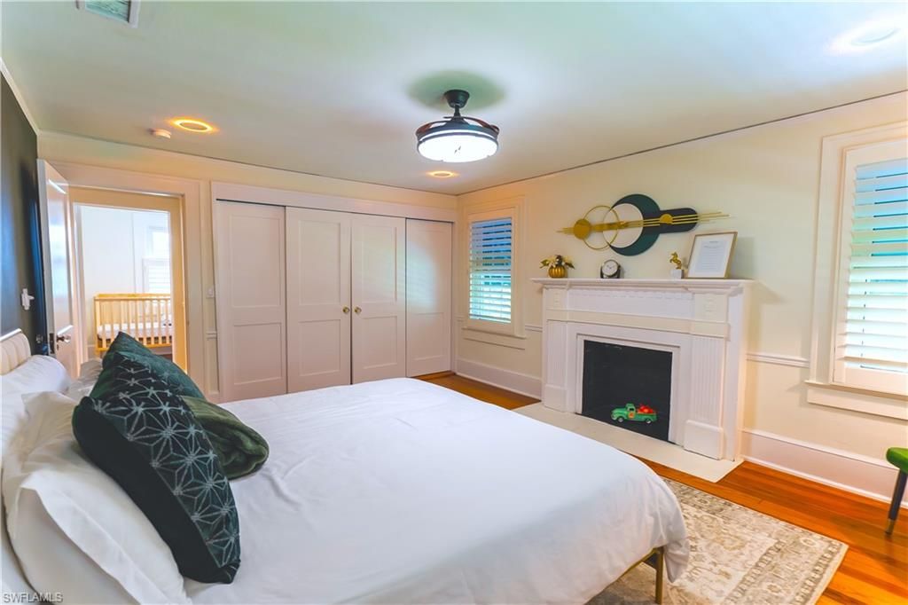Bedroom, Fireplace, Interior, Recessed Lighting, Wood Texture Flooring