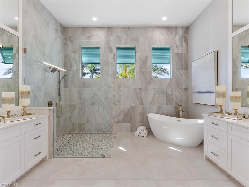 Bathroom, Dual Sink Vanities, Free Standing Baths, Glass Shower, Interior, Marble Walls, Recessed Lighting