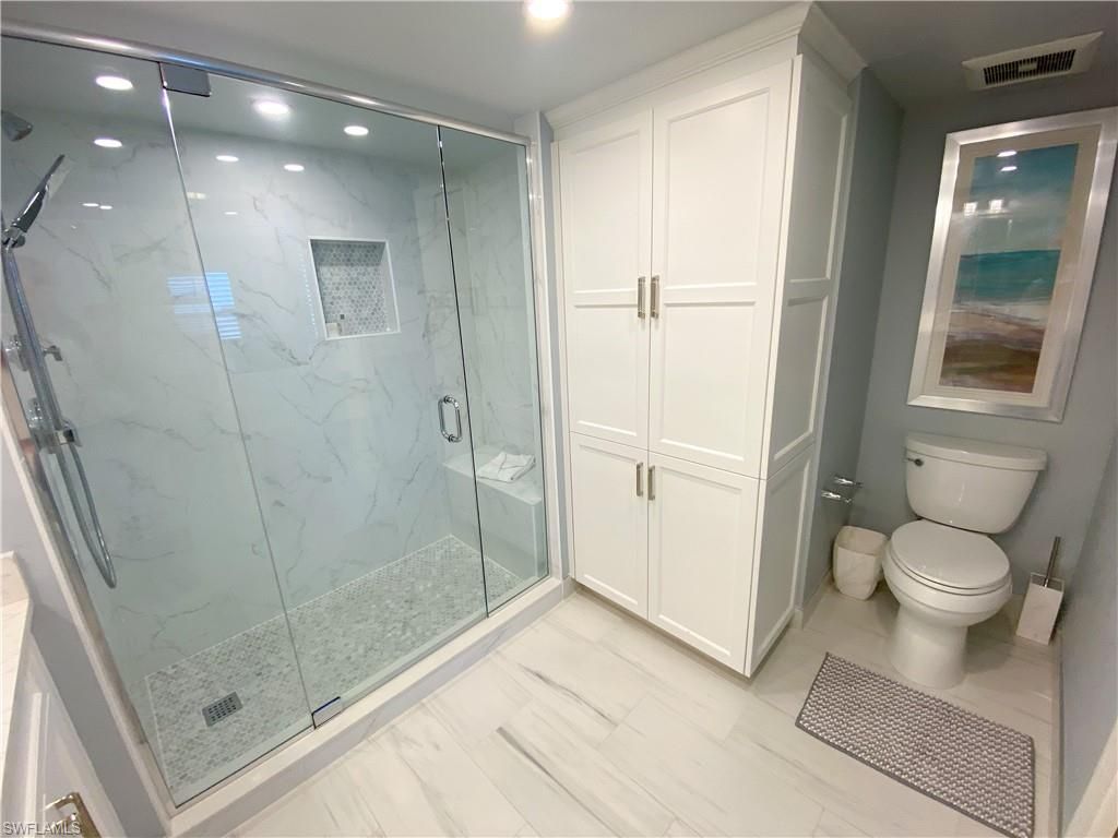 Bathroom, Glass Shower, Interior, Marble, Marble Walls, Recessed Lighting, Wood Texture Flooring