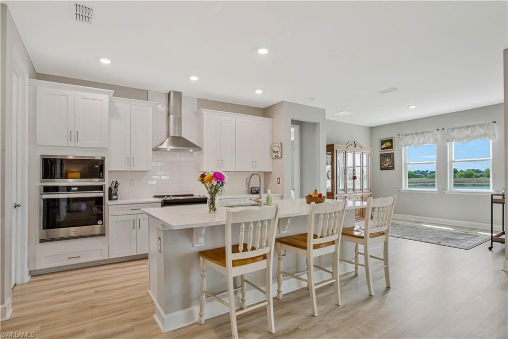 Interior, Kitchen, Recessed Lighting, Stainless Steel Appliances, Water, Wood Texture Flooring