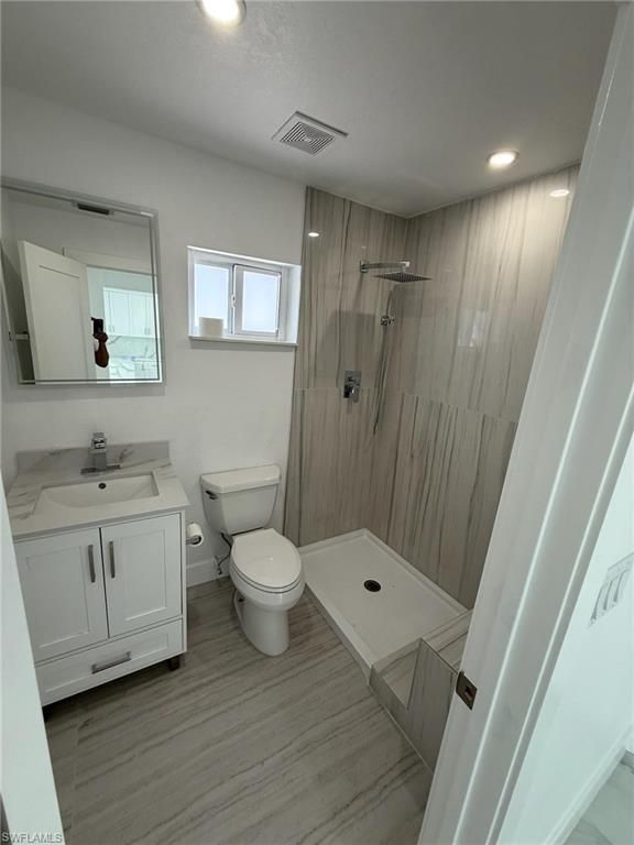 Bathroom, Glass Shower, Interior, Recessed Lighting, Wood Texture Flooring