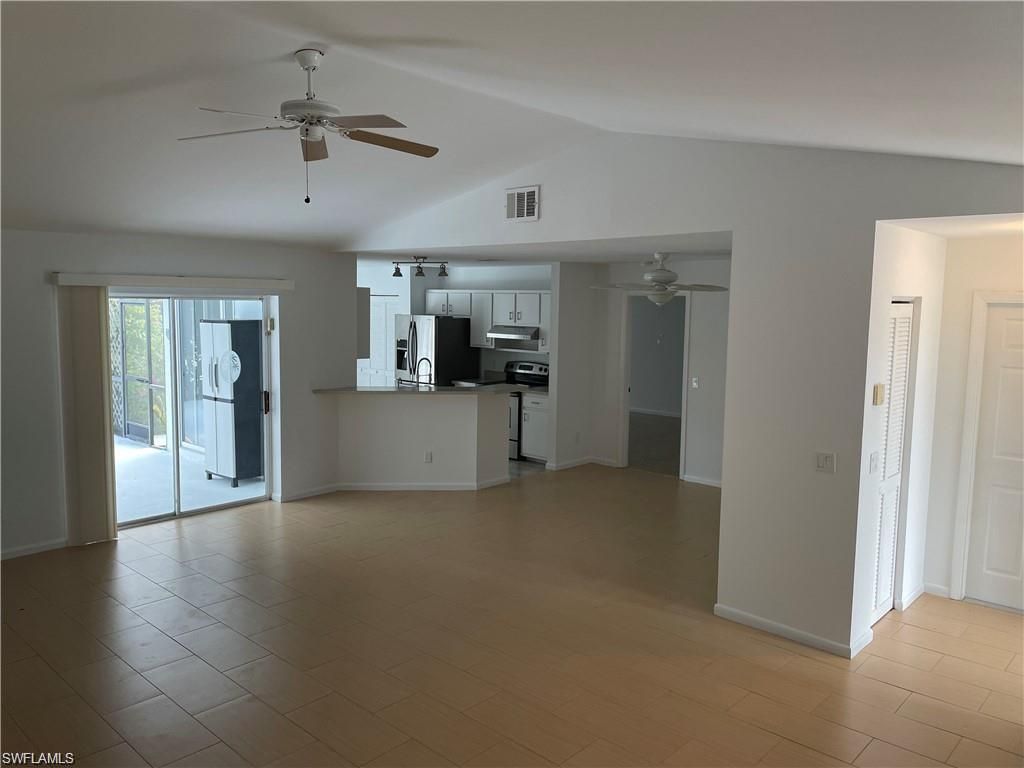 Empty room, Interior, Kitchen, Stainless Steel Appliances, Wood Texture Flooring