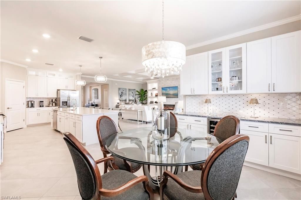 Chandelier, Dining room, Interior, Kitchen, Living room, Pendant Lights, Recessed Lighting, Stainless Steel Appliances
