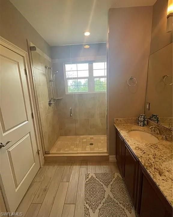 Bathroom, Glass Shower, Interior, Recessed Lighting, Wood Texture Flooring