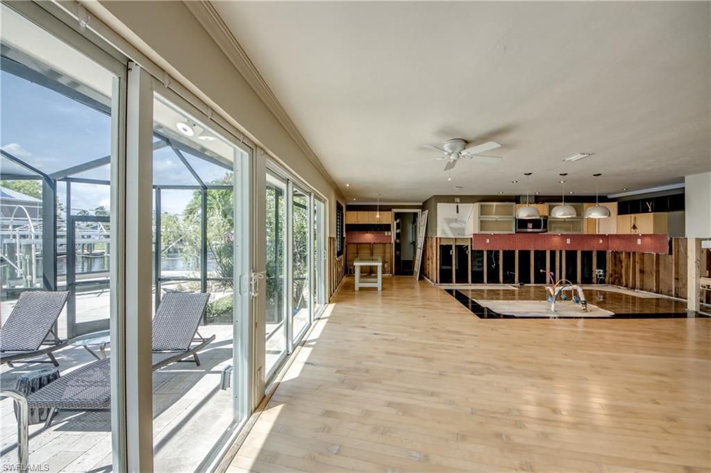 Glass Ceilings, Interior, Pendant Lights, Recessed Lighting, Sun Room, Wood Texture Flooring