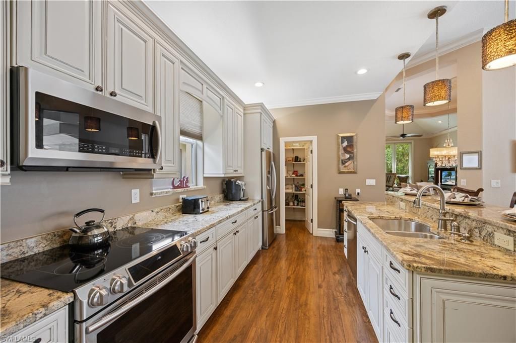 Interior, Kitchen, Pendant Lights, Recessed Lighting, Stainless Steel Appliances, Wood Texture Flooring