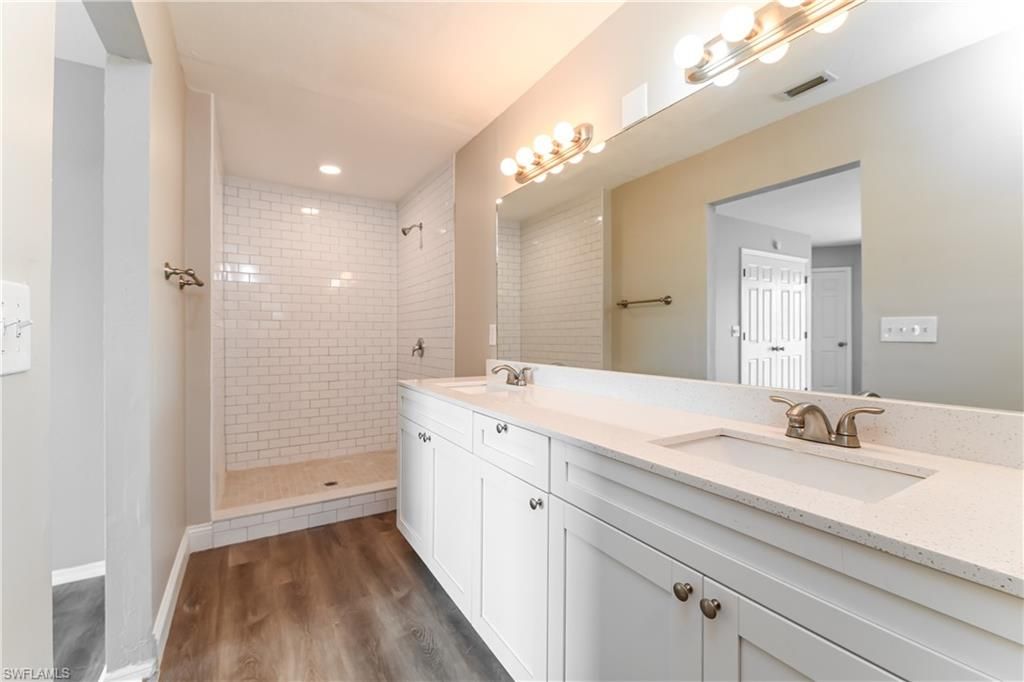 Bathroom, Dual Sink Vanities, Interior, Recessed Lighting, Wood Texture Flooring