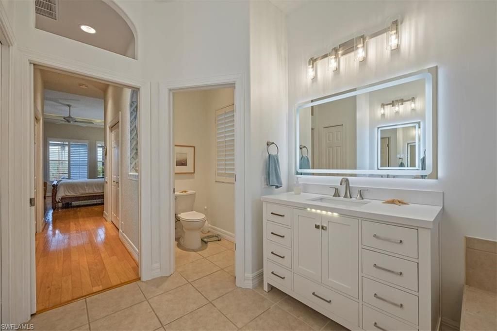 Bathroom, Bedroom, Dual Sink Vanities, Interior, Recessed Lighting, Wood Texture Flooring