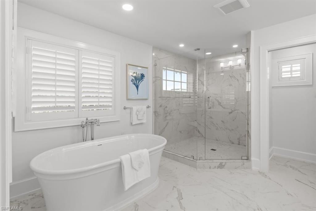 Bathroom, Free Standing Baths, Glass Shower, Interior, Marble, Marble Walls, Recessed Lighting