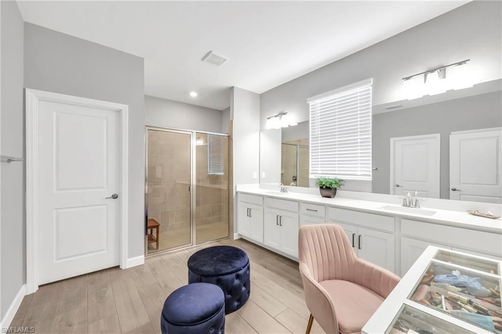 Bathroom, Dual Sink Vanities, Glass Shower, Interior, Recessed Lighting, Wood Texture Flooring