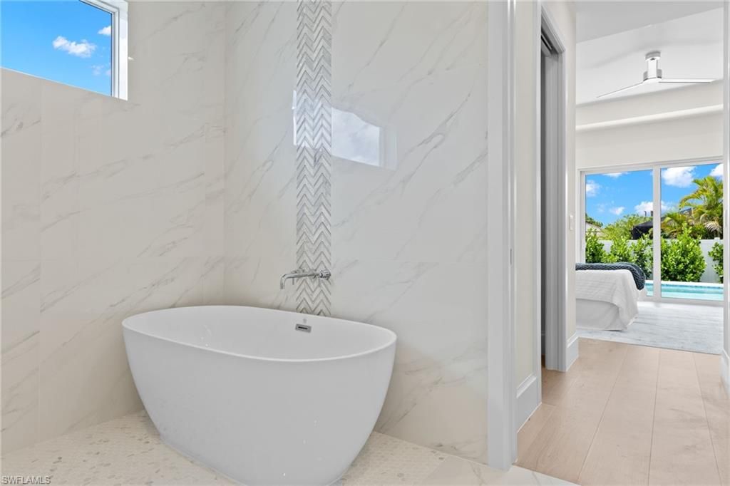 Bathroom, Free Standing Baths, Interior, Marble, Marble Walls, Wood Texture Flooring