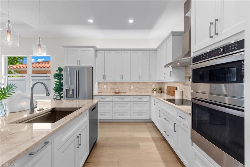 Interior, Kitchen, Pendant Lights, Recessed Lighting, Stainless Steel Appliances, Wood Texture Flooring