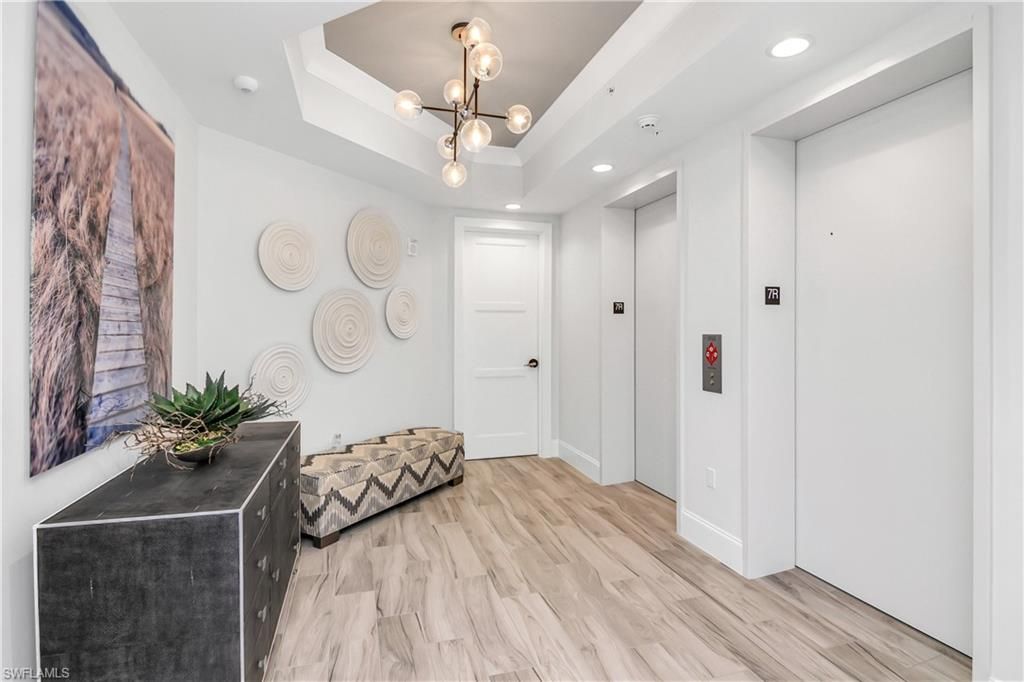 Elevator, Interior, Pendant Lights, Recessed Lighting, Wood Texture Flooring