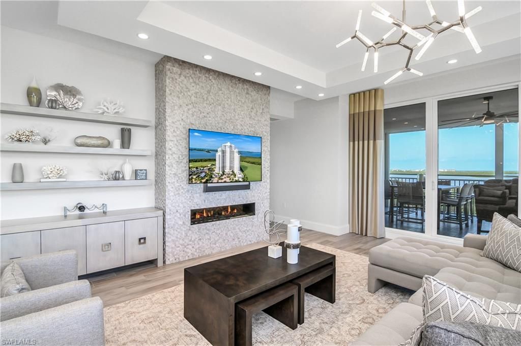 Fireplace, Interior, Living room, Pendant Lights, Recessed Lighting, Water, Wood Texture Flooring
