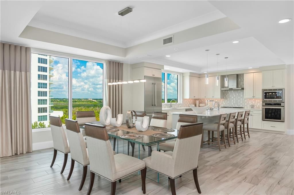 Dining room, Interior, Kitchen, Pendant Lights, Recessed Lighting, Stainless Steel Appliances, Water, Wood Texture Flooring
