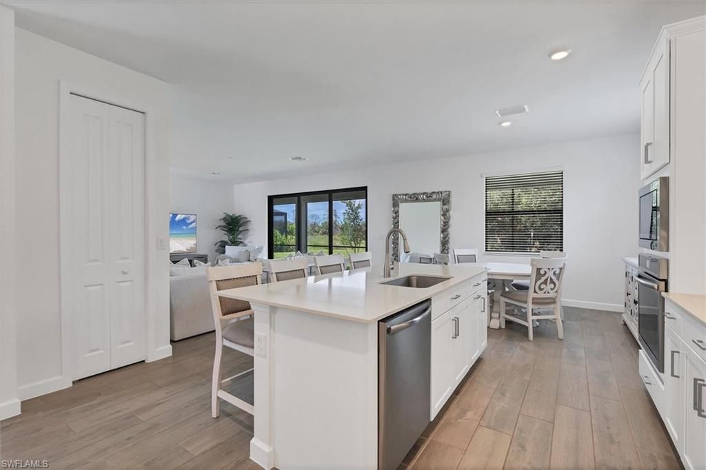 Dining room, Interior, Kitchen, Living room, Recessed Lighting, Wood Texture Flooring