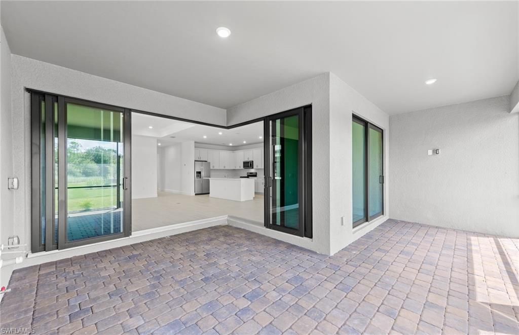 Empty room, Interior, Kitchen, Recessed Lighting, Stainless Steel Appliances