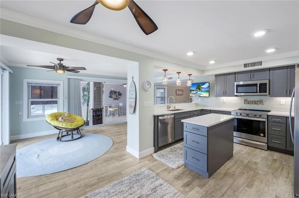 Interior, Kitchen, Pendant Lights, Recessed Lighting, Stainless Steel Appliances, Wood Texture Flooring