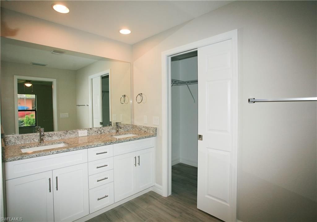 Bathroom, Dual Sink Vanities, Interior, Recessed Lighting, Wood Texture Flooring