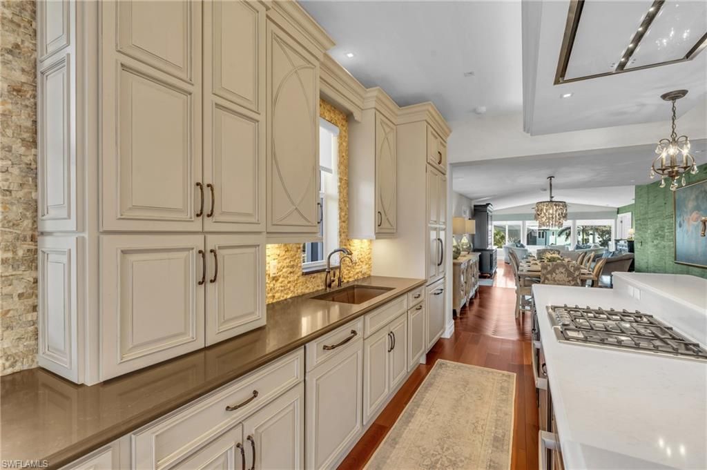 Chandelier, Dining room, Interior, Kitchen, Living room, Pendant Lights, Recessed Lighting, Wood Texture Flooring