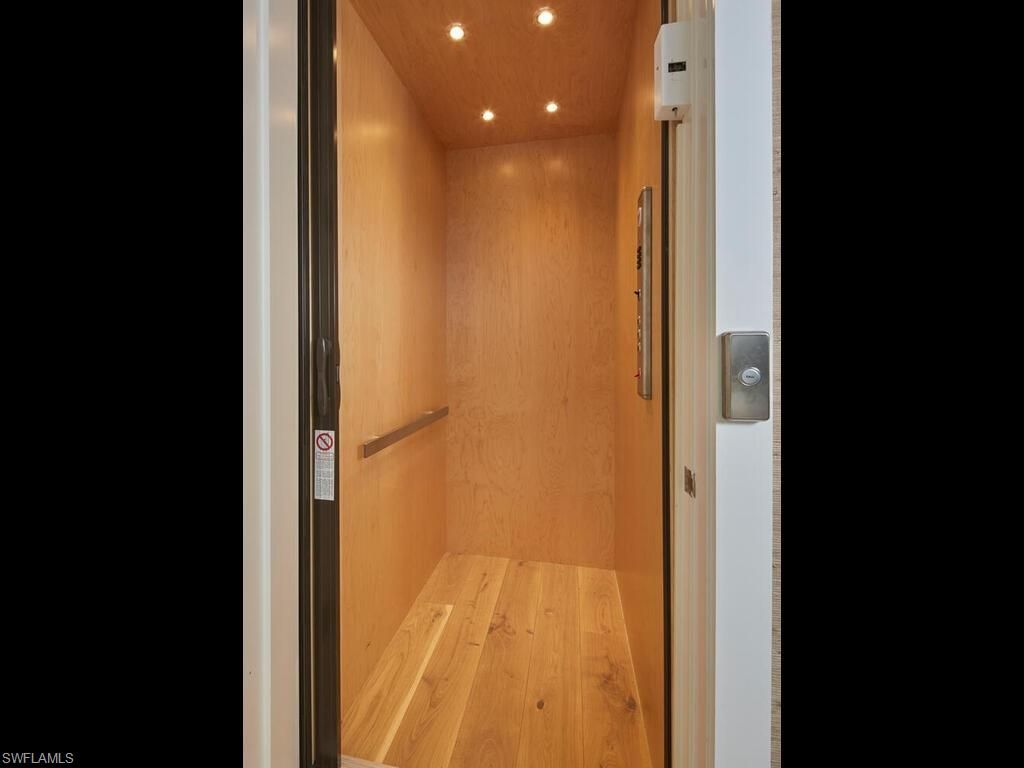 Elevator, Interior, Recessed Lighting, Wooden Ceilings, Wood Texture Flooring, Wooden Walls