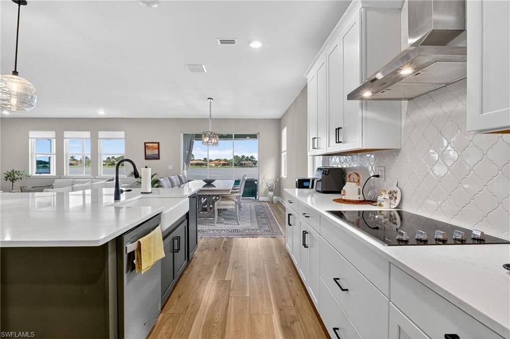 Chandelier, Dining room, Interior, Kitchen, Pendant Lights, Recessed Lighting, Wood Texture Flooring