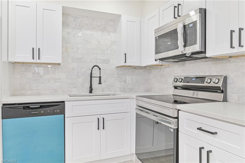 Interior, Kitchen, Marble Walls, Stainless Steel Appliances