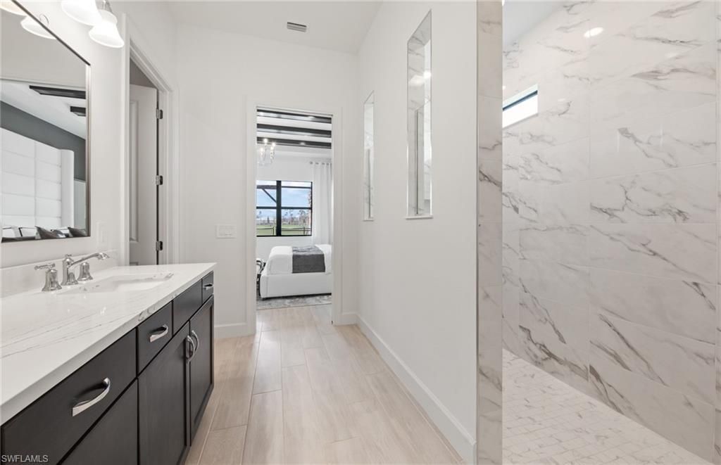 Bathroom, Bedroom, Dual Sink Vanities, Interior, Marble, Marble Walls, Wood Texture Flooring