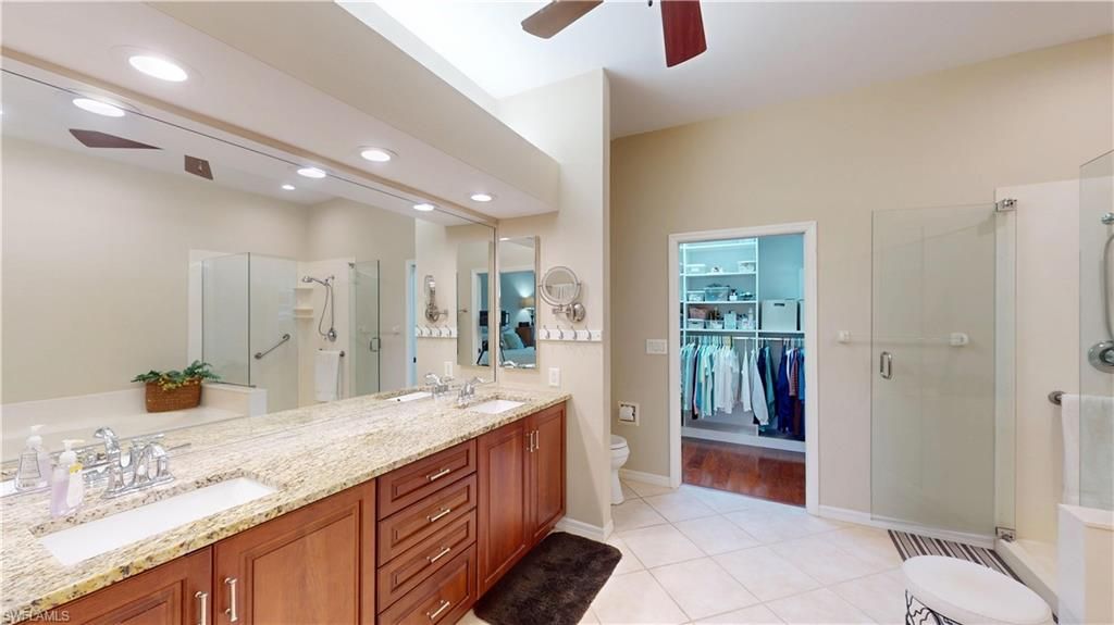 Bathroom, Dual Sink Vanities, Glass Shower, Interior, Recessed Lighting, Walk-in Closets, Wood Texture Flooring