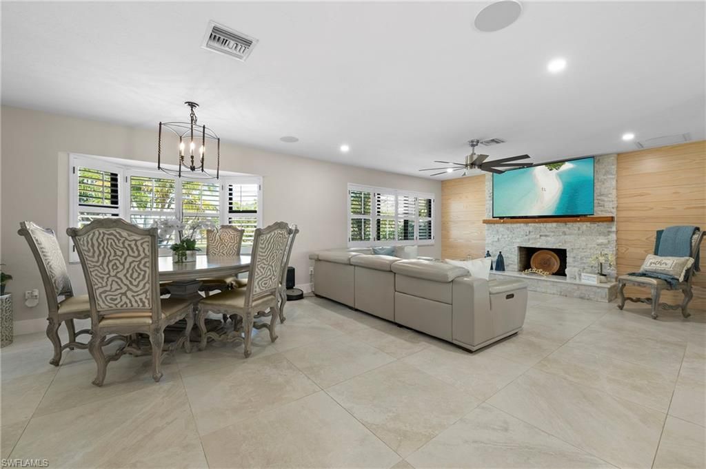 Dining room, Fireplace, Interior, Living room, Pendant Lights, Recessed Lighting, Wooden Walls