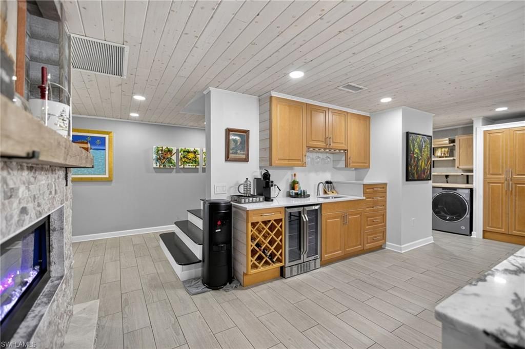 Fireplace, Interior, Kitchen, Recessed Lighting, Washer, Wooden Ceilings, Wood Texture Flooring
