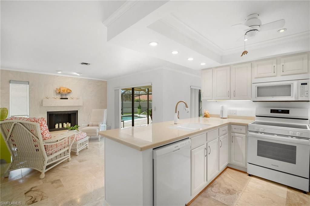 Fireplace, Interior, Kitchen, Recessed Lighting, Stainless Steel Appliances