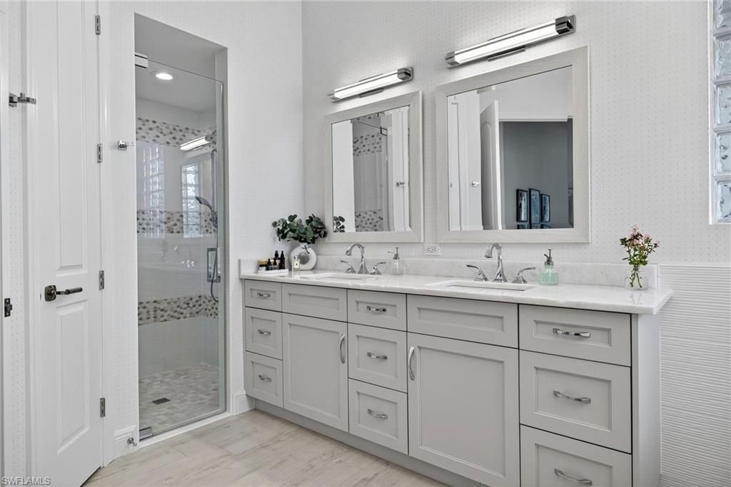 Bathroom, Dual Sink Vanities, Glass Shower, Interior, Recessed Lighting, Wood Texture Flooring