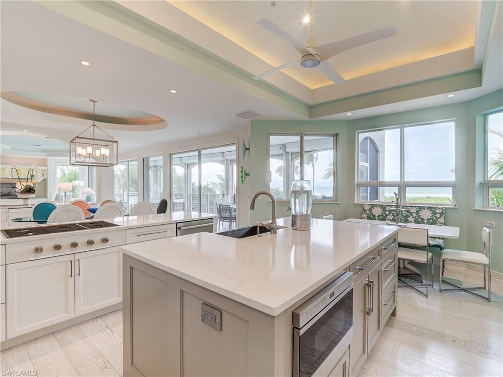 Chandelier, Dining room, Interior, Kitchen, Pendant Lights, Recessed Lighting, Water, Wood Texture Flooring
