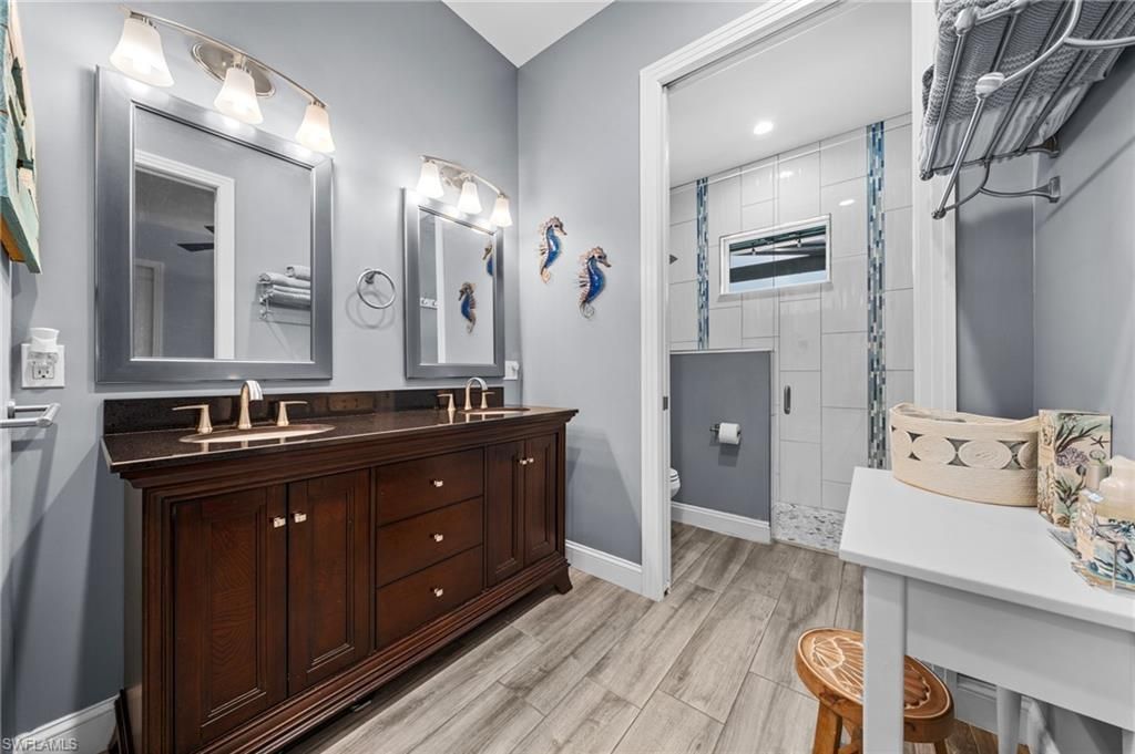 Bathroom, Dual Sink Vanities, Interior, Recessed Lighting, Wood Texture Flooring