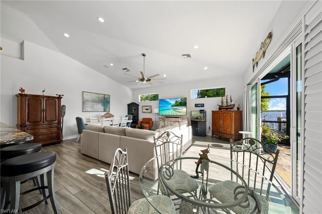 Dining room, Interior, Living room, Recessed Lighting, Water, Wood Texture Flooring