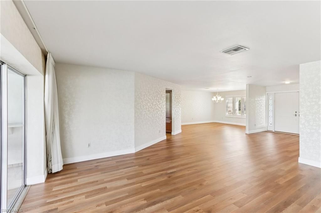 Chandelier, Empty room, Interior, Recessed Lighting, Wood Texture Flooring