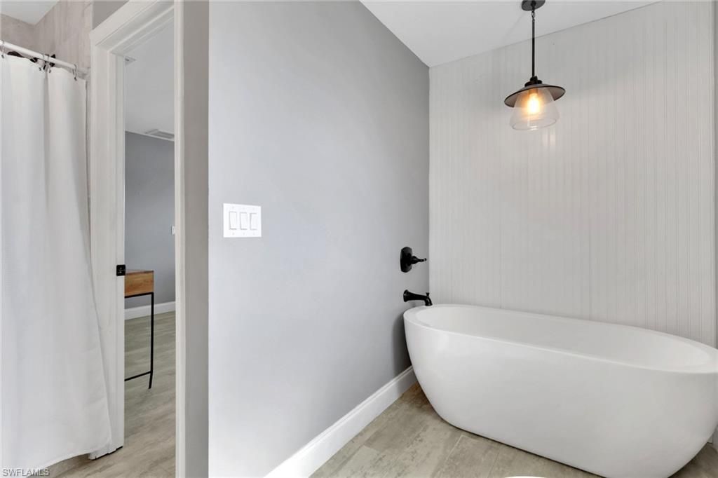 Bathroom, Free Standing Baths, Interior, Pendant Lights, Wood Texture Flooring