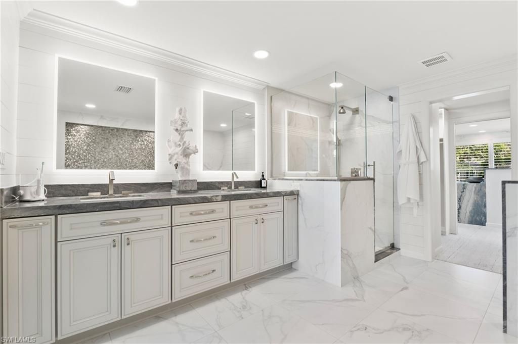 Bathroom, Dual Sink Vanities, Glass Shower, Interior, Marble, Marble Walls, Recessed Lighting