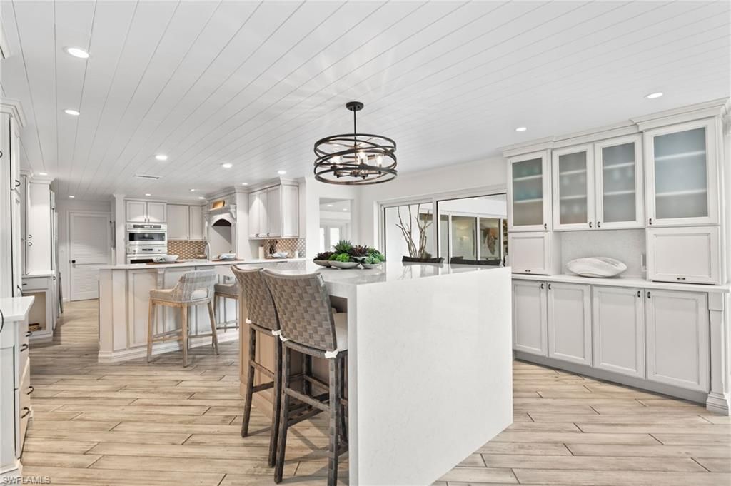 Chandelier, Interior, Kitchen, Pendant Lights, Recessed Lighting, Stainless Steel Appliances, Wood Texture Flooring