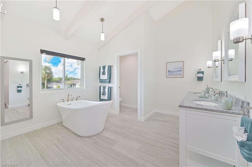 Bathroom, Dual Sink Vanities, Free Standing Baths, Interior, Pendant Lights, Wood Texture Flooring