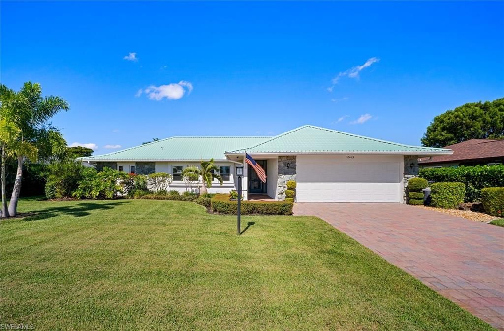 Attached, Backyard, Exterior, Facade, Brick Facade, Ranch